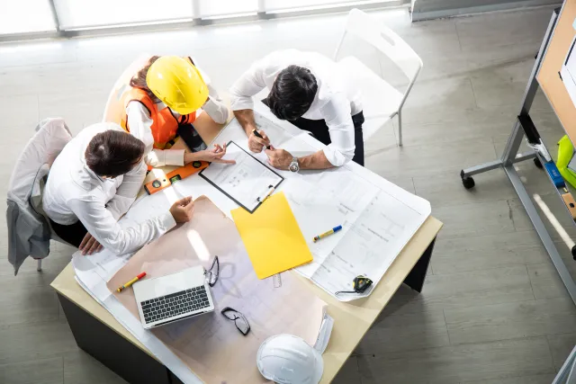 Hero image showing a modern workspace with technology devices